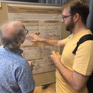 Dawid at his poster with Ben Luisi, RNA Decay 2026, Berlin
